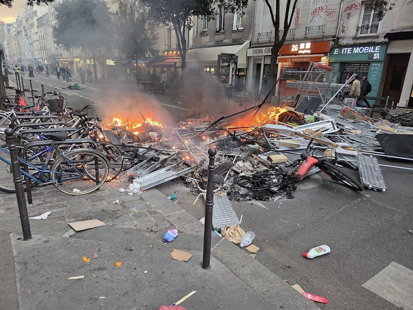 A burning barricade on the rue Beaubourg in Paris on Oct. 17, 2026